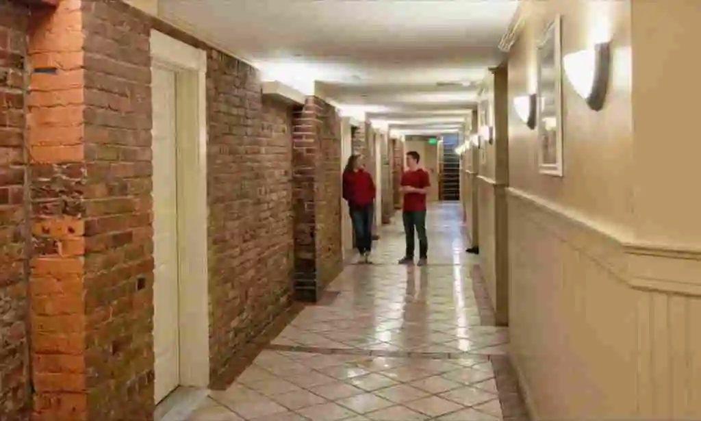Multi-unit apartment hallway typical of downtown Bloomington rental buildings and mixed-use properties